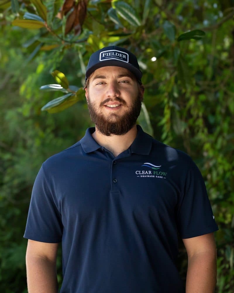 Canyon Swisher, Clear Flow service specialist, in a Clear Flow polo and Fielder cap